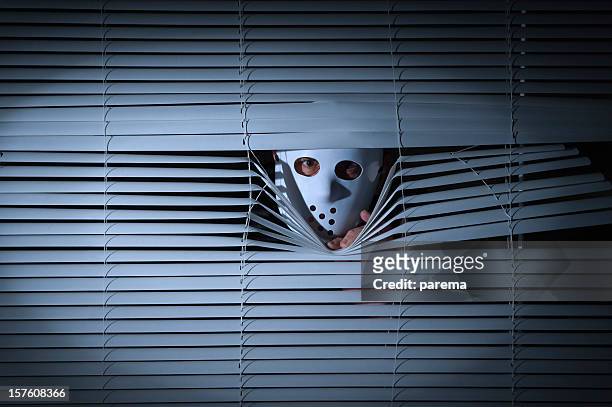 spooky men behind blinds - insanity stock pictures, royalty-free photos & images