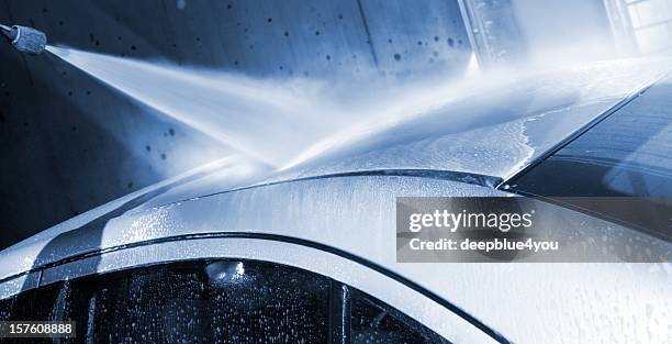 car wash - with a water jet at carwash service - car wash stock pictures, royalty-free photos & images