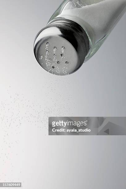 salt coming out, close-up - salt shaker stock pictures, royalty-free photos & images