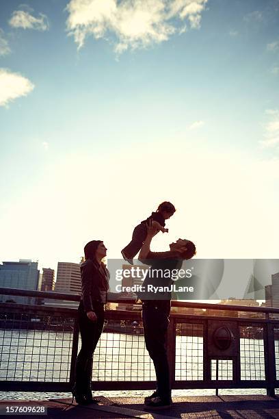 young hispanic family and child - willamette river stock pictures, royalty-free photos & images