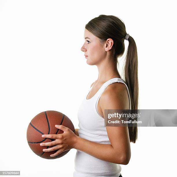 teenage female athlete with basketball - girl in tank top stock pictures, royalty-free photos & images