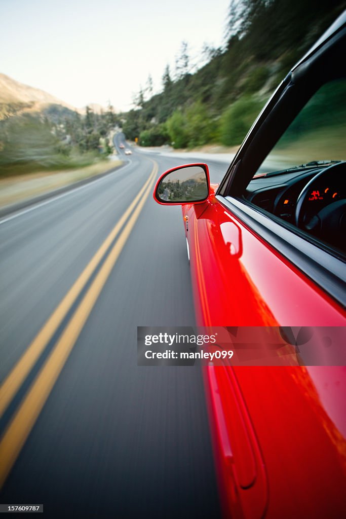 Driving fast on the mountain road