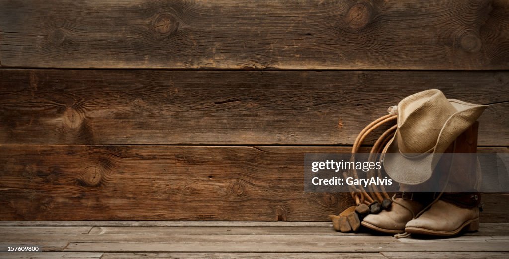 Western barnwood background w/boots,hat,lasso-extra wide