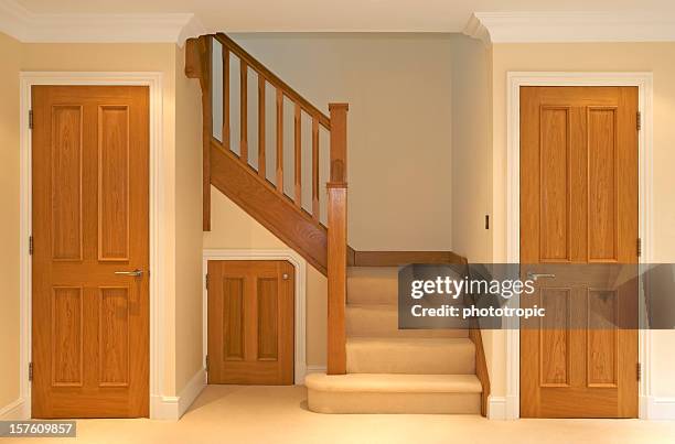 oak stairway and doors - ballustrade stockfoto's en -beelden