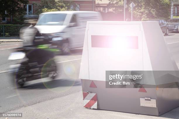 police speed camera with a fast motorcycle - auto radar stock pictures, royalty-free photos & images