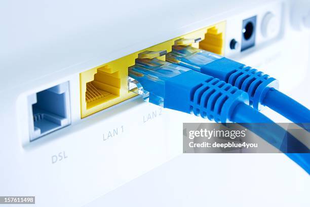 internet connection with router - man and machine stock pictures, royalty-free photos & images