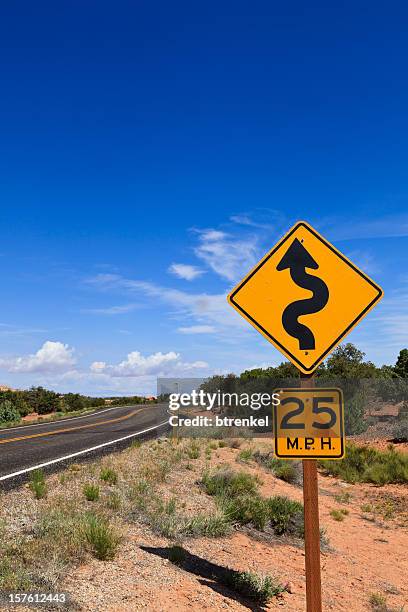 curve ahead - speed limit sign stock pictures, royalty-free photos & images