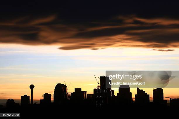 downtown calgary with chinook cloud - downtown calgary stock pictures, royalty-free photos & images