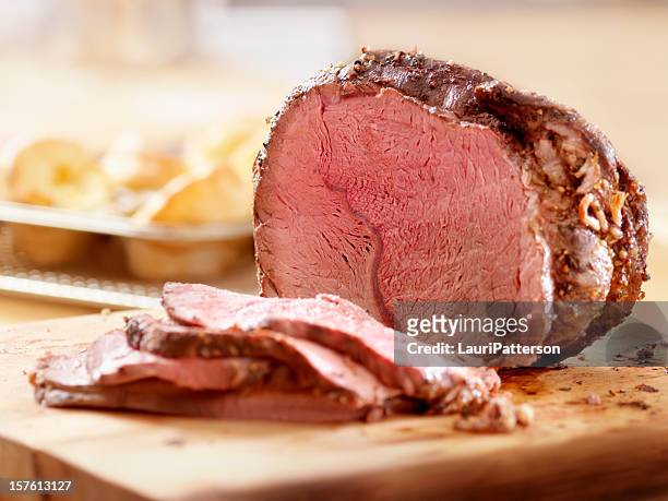 cross rib beef roast with yorkshire puddings - english culture stock pictures, royalty-free photos & images