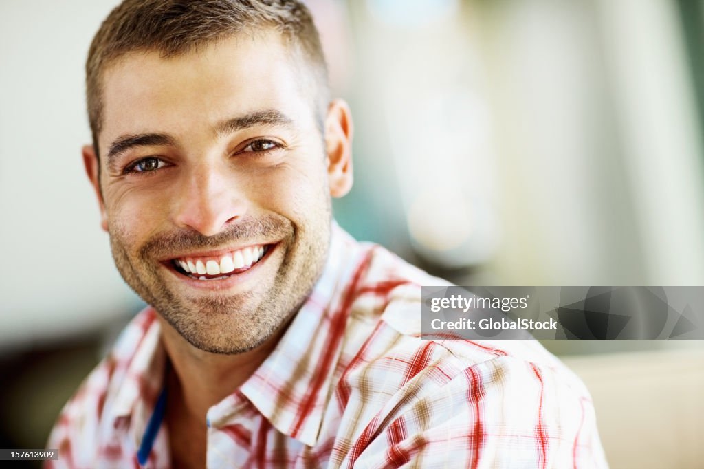 Portrait of a smiling young man with copy space