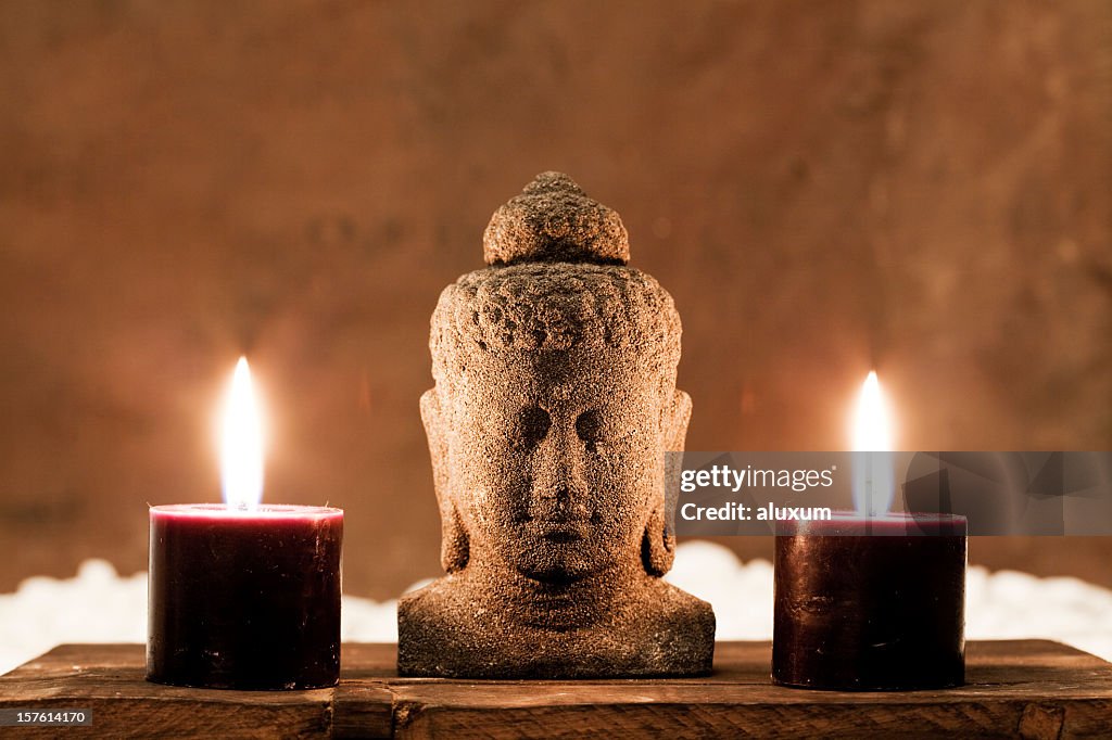 Buddha statue and candles