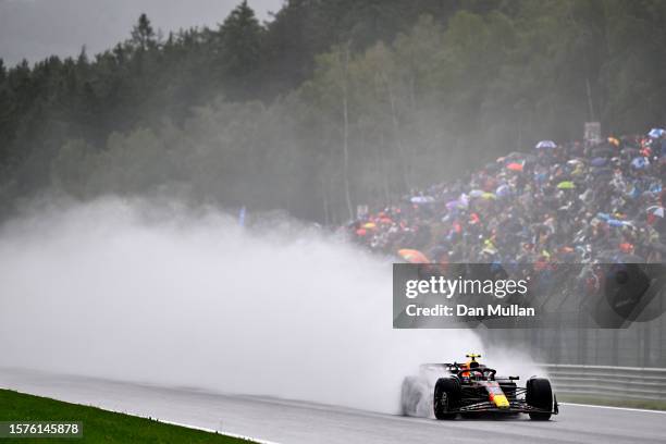 Sergio Perez of Mexico driving the Oracle Red Bull Racing RB19 in the rain during practice ahead of the F1 Grand Prix of Belgium at Circuit de...