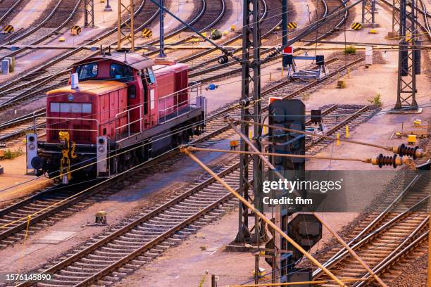 parked locomotive at a marshalling yard - consumer protection stock pictures, royalty-free photos & images