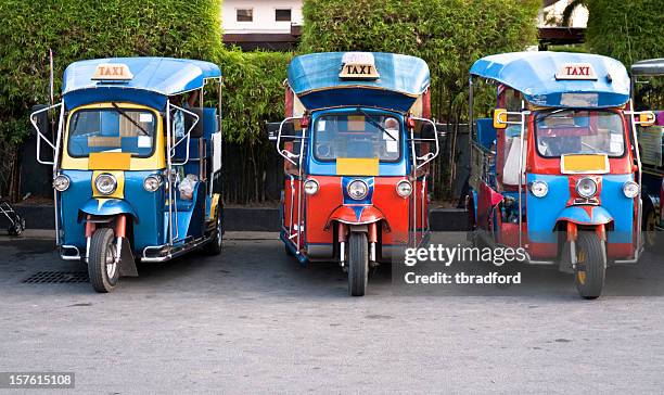 three tuk-tuks (motorised rickshaws) in hua hin, thailand - hua hin thailand stockfoto's en -beelden