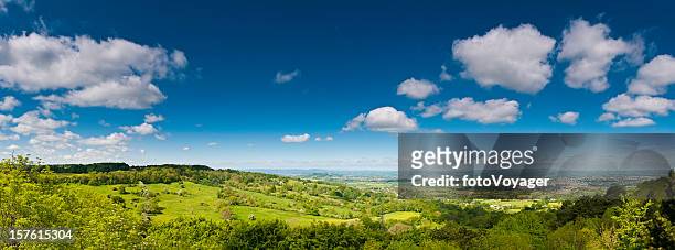 lush green landscape summer country panorama farms fields big sky - gloucestershire stock pictures, royalty-free photos & images