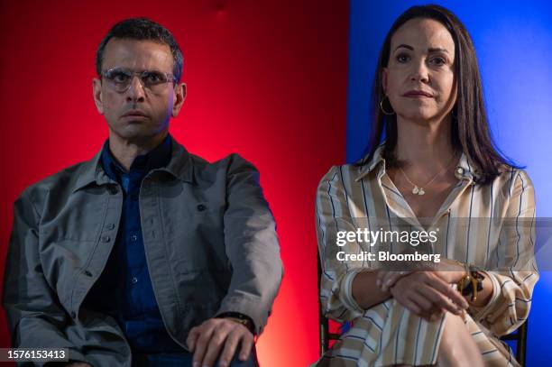 Henrique Capriles, opposition leader and former governor of the State of Miranda, left, and Maria Corina Machado, presidential primary candidate for...