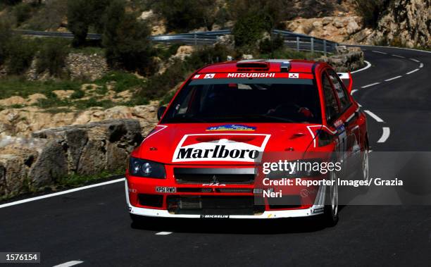 Francois Delecour and Daniel Grataloup driving the Mitsubishi Lancer Evo during the Spanish World Rally Championship in the Catalunyan region, Spain....