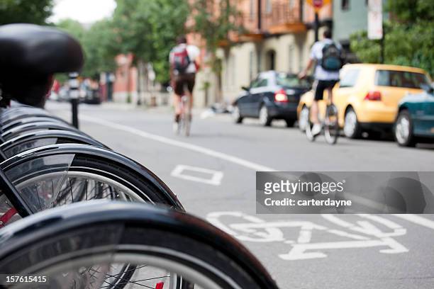 public bike rental system and bicycle rider commuters, montreal - montreal city stockfoto's en -beelden