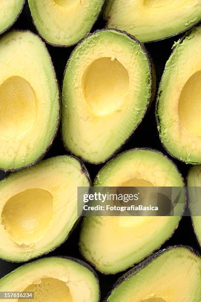 avocado halves - avocado bildbanksfoton och bilder