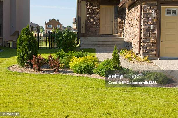 front yard of luxury suburban house. - landscaped stock pictures, royalty-free photos & images
