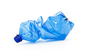 crushed blue plastic bottle