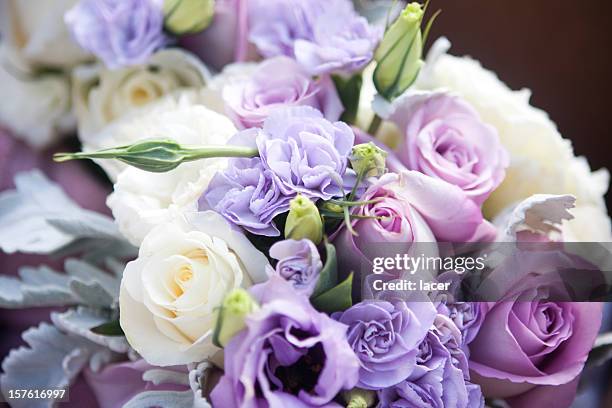 light purple and white roses in wedding bouquet - wedding bouquet stock pictures, royalty-free photos & images