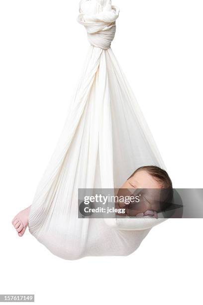 newborn baby sleeping in a hammock - baby isolated stockfoto's en -beelden