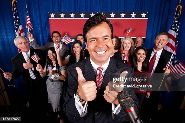 politician victory celebration-thumbs up - president podium stock pictures, royalty-free photos & images