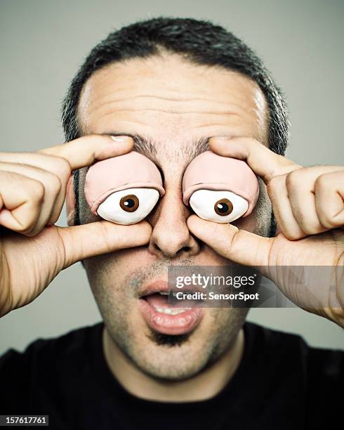 clay eyes man - cheesy grin stock pictures, royalty-free photos & images