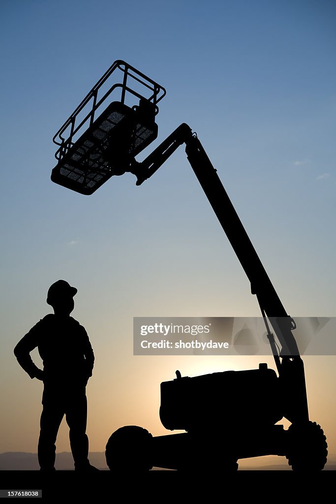 Hydraulic Lift and Construction Worker