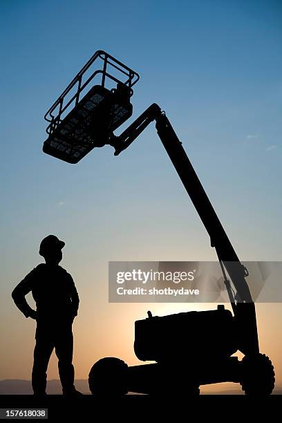 hydraulic lift and construction worker - mobile crane stock pictures, royalty-free photos & images