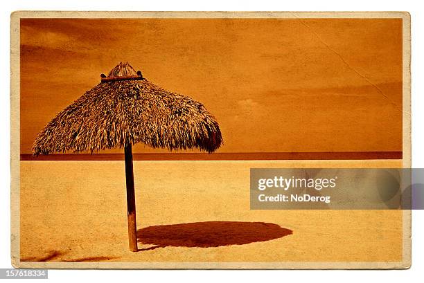 vintage travel postcard of straw umbrella beach shelter - beach shelter stockfoto's en -beelden