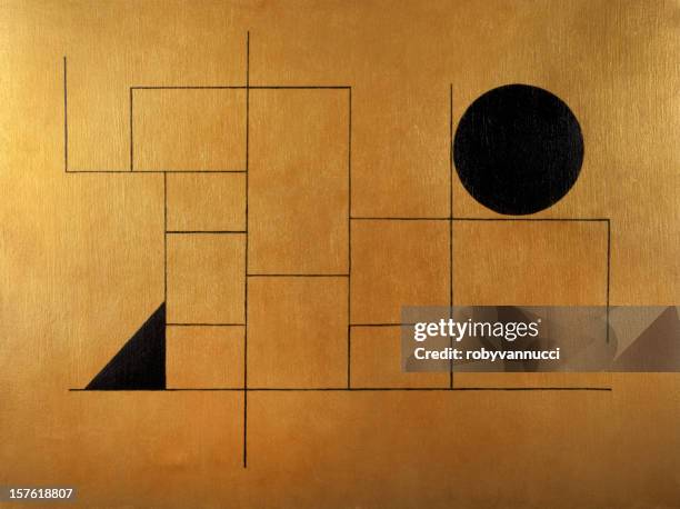 geometric subject with black sphere and triangle on golden background - geometric painting stock pictures, royalty-free photos & images