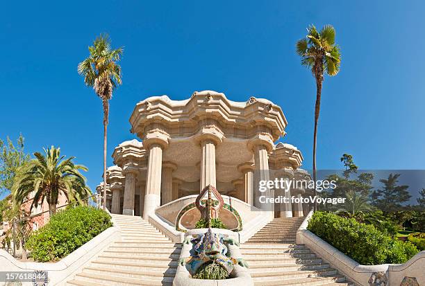 barcelona parc güell gaudí mosaic dragon terrace pillars catalonia spain - barcelona gaudi stock pictures, royalty-free photos & images