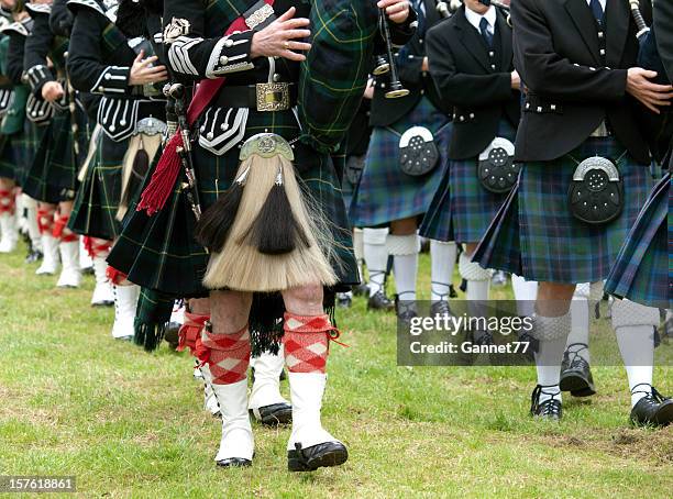 pipers in a marching band, scotland - piper stock pictures, royalty-free photos & images