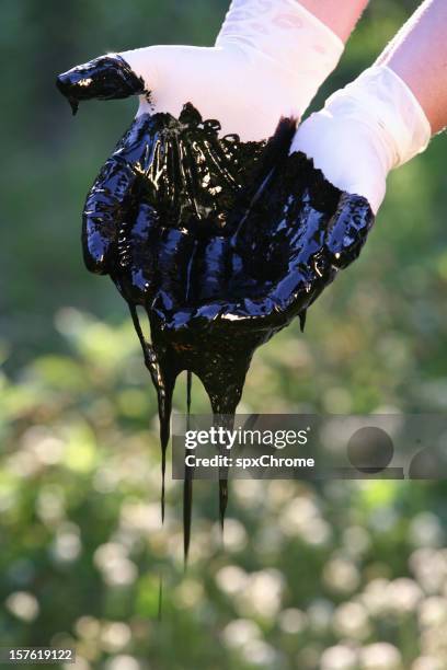 oil tar - oil slick stock pictures, royalty-free photos & images