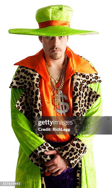 brightly dressed man - pimp costumes stock pictures, royalty-free photos & images