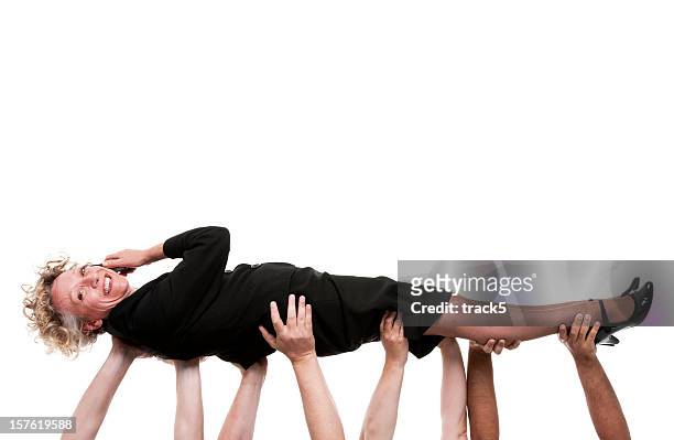 business support - crowd surfing stock pictures, royalty-free photos & images