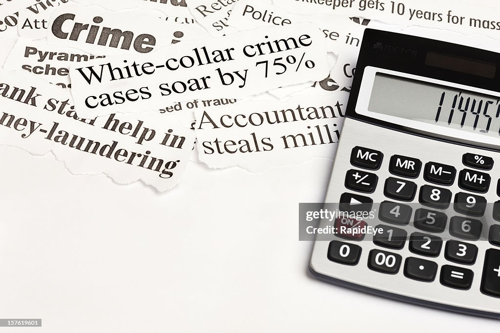 Calculator next to headlines about white collar crime
