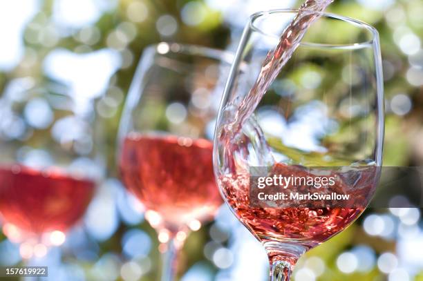 rose wine alfresco - sunlight through drink glass stock pictures, royalty-free photos & images