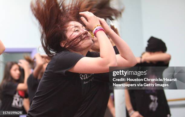 Christina Cardena and other reKreation Dance Company dancers rehearse for the 7th AnnualTexas Salsa Congress on Sunday, Feb. 27 in Houston....