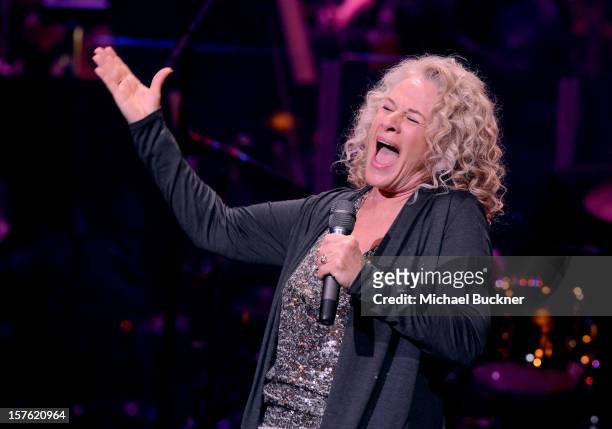 Singer/songwriter Carole King performs onstage during a celebration of Carole King and her music to benefit Paul Newman's The Painted Turtle Camp at...