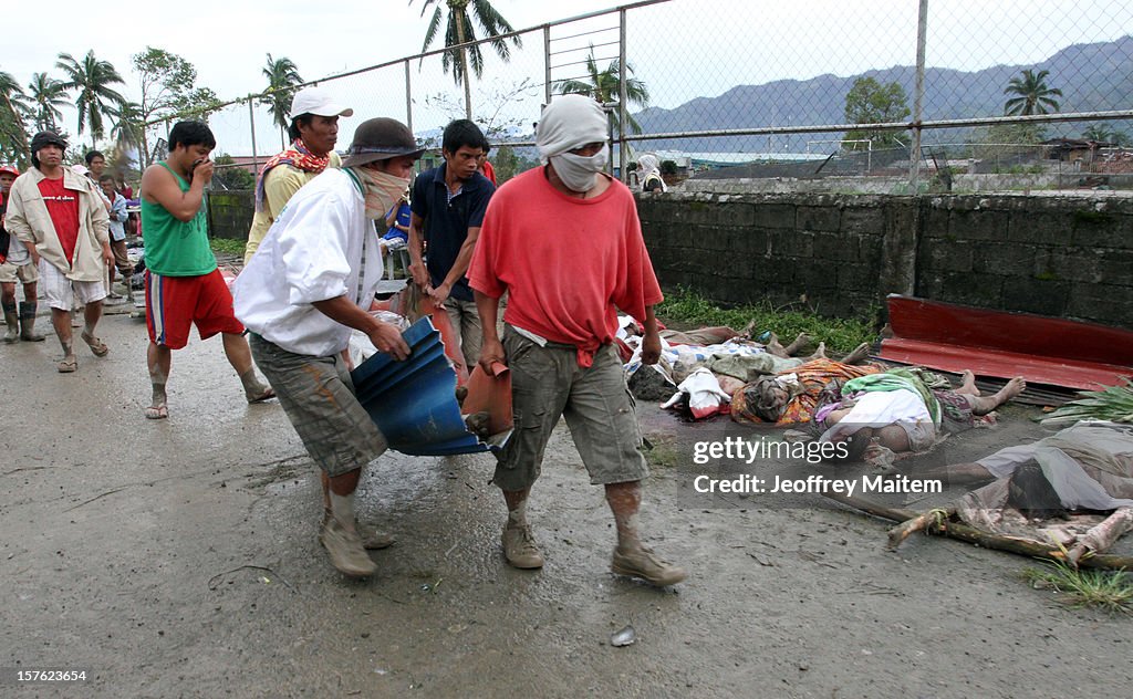 At Least 100 Killed And Thousands Evacuated As Typhoon Bopha Pounds Southern Philippines