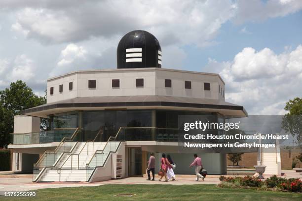 Devotees walk into Sri Saumyakasi Sivalaya Hindu Temple, dedicated to Shiva, at the Chinmaya Praba Mission on Sunday, July 10 in Houston. On a Sunday...