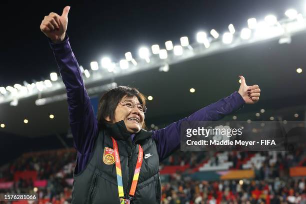 Shui Qingxia, Head Coach of China PR, applauds fans after her team's 1-0 victory in the FIFA Women's World Cup Australia & New Zealand 2023 Group D...