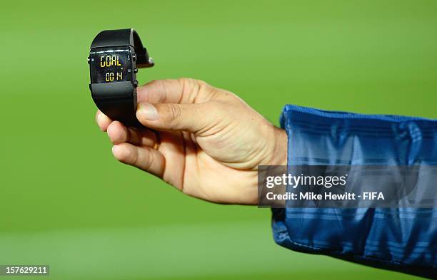 The referee's watch for the GoalRef system is displayed with the word "Goal" visible during the Goal-Line Technology demonstration at International...