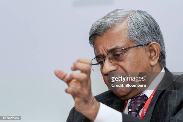 Diwakar Gupta, managing director and chief financial officer of State Bank of India Ltd. , gestures as he speaks during the PwC CFO Conclave in...