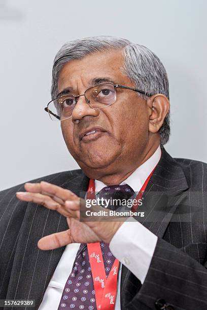 Diwakar Gupta, managing director and chief financial officer of State Bank of India Ltd. , gestures as he speaks during the PwC CFO Conclave in...