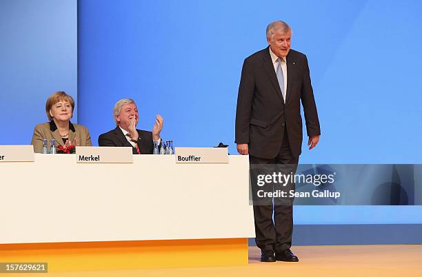 Horst Seehofer , Chairman of the Christian Social Union , the Bavarian sister party of the German Christian Democratic Union , bows to delegates...