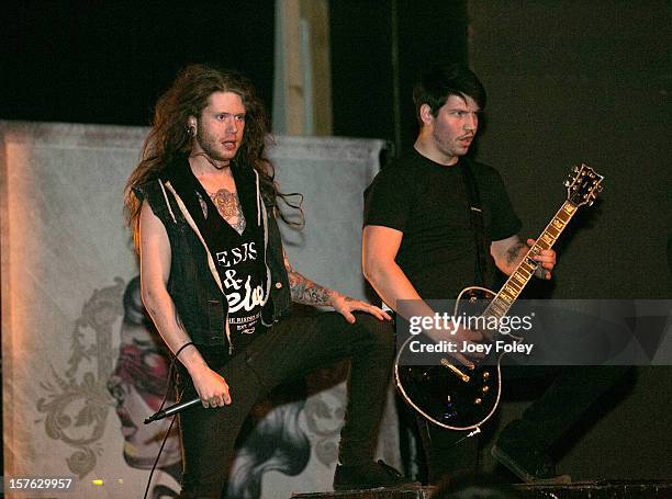 Vocalist Todd Jansen and Guitarist Dennis Tuohey of the metalcore band Assassins performs at The Irving Theater on December 4, 2012 in Indianapolis,...